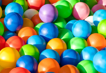 Background with colored balls. Yellow blue red orange