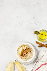 Spiced cinnamon apple pie porridge. Top view, space for text.