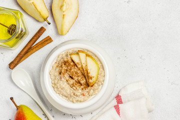 Spiced cinnamon apple pie porridge. Top view, space for text.