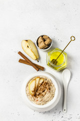 Spiced cinnamon apple pie porridge. Top view, space for text.