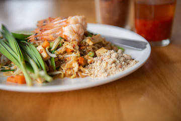 fried noodle or Pad Thai and shrimp, popular menu of Thailand.