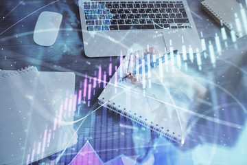Forex chart displayed on woman's hand taking notes background. Concept of research. Multi exposure