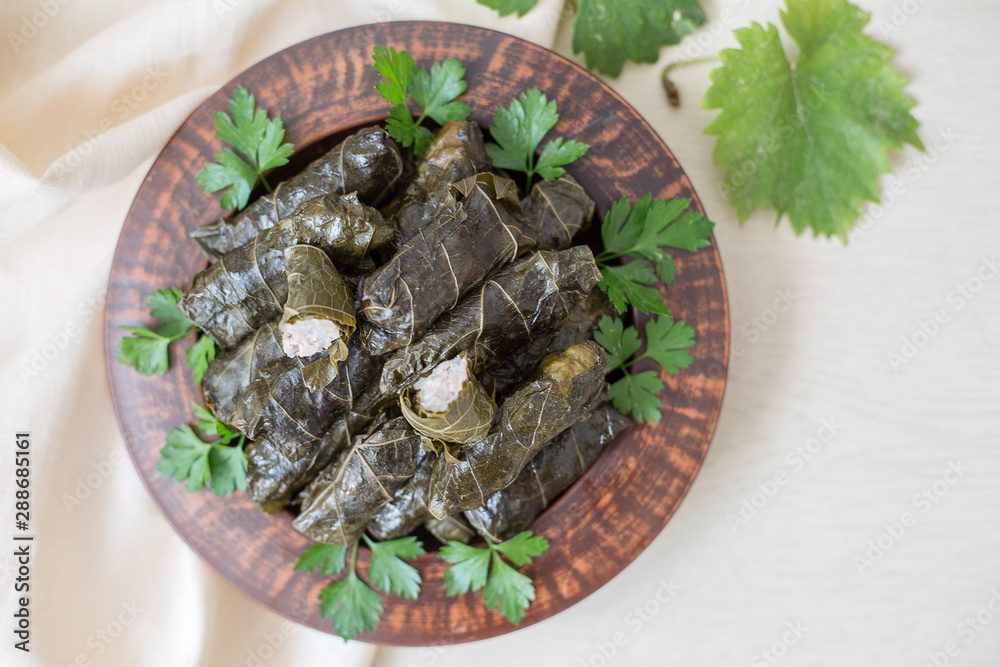 Canvas Prints Homemade dolma - stuffed grape leaves. Rice and turkey fillings. Warm dish.