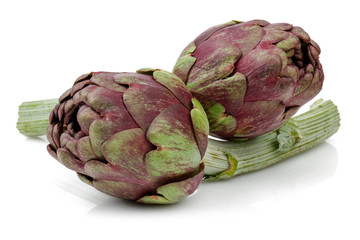 Obraz premium Fresh artichokes isolated on white background