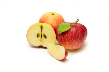 Ripe red apple with apple leaf. Isolated on a white background.