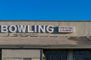 Vintage bowling and cocktail sign