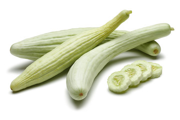 Fresh Armenian cucumbers with slices isolated on white background