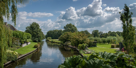 Naklejka na ściany i meble Dutch watervillage Giethoorn. Netherlands. Overijssel. Canal.