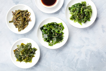 Various seaweed, sea vegetables, shot from the top with a place for text. Superfoods background
