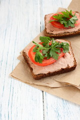 Delicious sandwiches for a snack on the table. 