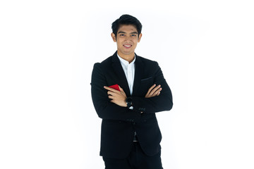 Obraz na płótnie Canvas Handsome young businessman Asian caucasian wear a black suit with black hair, be a smile and standing smart poses. Hold and use a smartphone. On white background.
