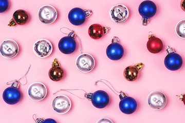 New Year Christmas Creative Background with Red and Silver Brown Christmas Balls on Pink Background Christmas Flat Lay Top View Festive Holiday Card or Background Pattern