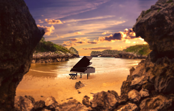 Piano in nature.Surreal image related to piano music,song and melody.Beach and ocean in cliffs scenic landscape