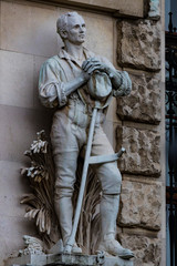 Statues adorning the facade of the Austrian National Library