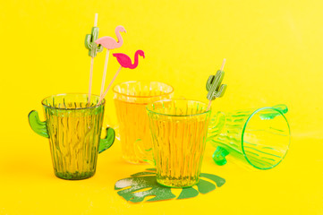 tequila in cactus glass with limes
