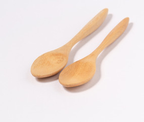Wooden spoon on white  background