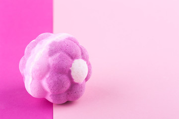 Aroma bath bomb on pink background