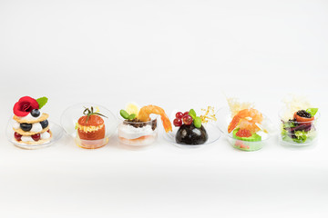 Mini canapes for refreshments at banquets receptions catering on a white background.