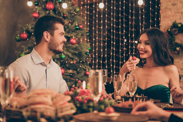 Portrait of his he her she nice-looking attractive glamorous smart stylish cheerful cheery guys spending vacation having fun eating tasty yummy delicious homemade delicacy in decorated house