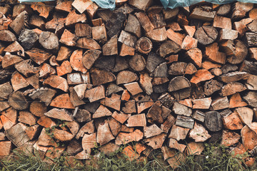 Stacked wooden logs, chopped firewood