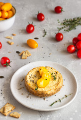 Savoury cheesecake with tomatoes and thyme.