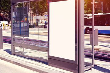 Mockup of a blank empty white advertising urban billboard, placeholder template at city train stop, space for design layout.