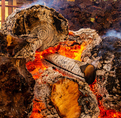 large and thick red-hot log fire