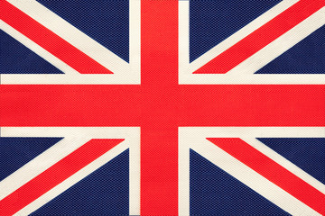 Great Britain national fabric flag, textile background. Symbol of United kingdom.