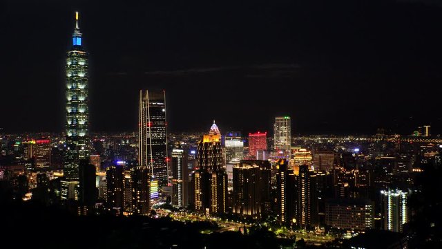TAIPEI, TAIWAN - CIRCA AUGUST 2019 : Aerial view of cityscape of Taipei at night. View of shopping and business district at Xinyi area.