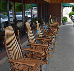 Rocking chairs on the front porch of a restaurant