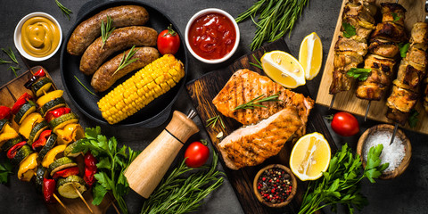 Barbeque dish - Grilled meat, fish, sausages and vegetables.