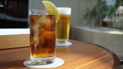 Cuba libre and beer on the table