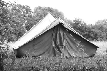 Old canvas tent in tourist camp in summer