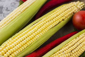 Top view fresh corn and tomatoes