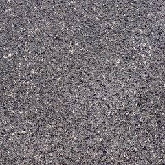 Seamless dark grey granite stone texture. Material construction.
