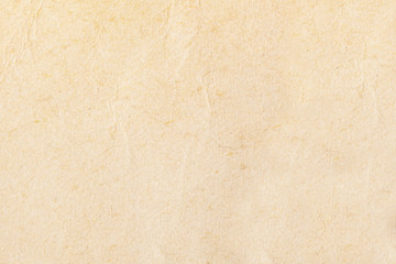 Texture of beige old paper, crumpled background. Vintage white grunge surface backdrop.