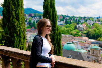 Fototapeta na wymiar Young Girl at Cityscape in Baden Baden Baden Wurttemberg Germany
