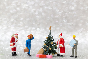 Miniature people : Worker team prepare christmas tree , Christmas decoration concept