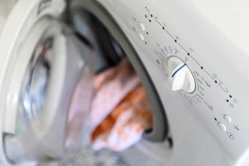 Top view of open loaded washing machine