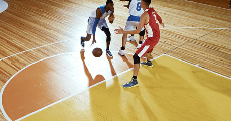 Fototapeta na wymiar Professional basketball player in action on a sports arena