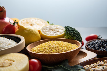 Fresh seasonal fruits and vegetables and millet food