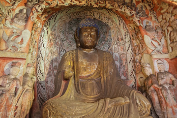 Fototapeta na wymiar Buddha statue in cave 6 of the Yungang Grottoes near Datong