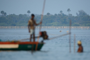 Fishermen in a lake