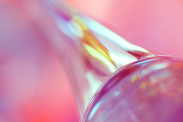 macro view and unfocused pink glass