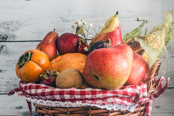 Basket with ripe vegetables and fruits. Save space. background of nature, Concept of biological, bio products, bio ecology, vegetarians.Autumn nature concept . Thanksgiving dinner . Vegetarian food