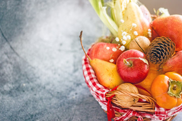 Basket with ripe vegetables and fruits. Save space. background of nature, Concept of biological, bio products, bio ecology, vegetarians.Autumn nature concept . Thanksgiving dinner . Vegetarian food