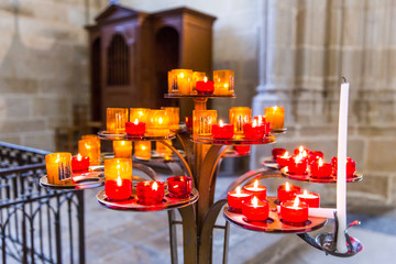 Red, White and Orange Prayers Candles Lit Up in Nantes Cathedral Saint-Pierre and Saint-Paul