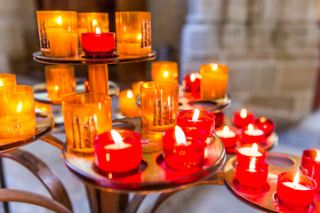 Red, White and Orange Prayers Candles Lit Up in Nantes Cathedral Saint-Pierre and Saint-Paul