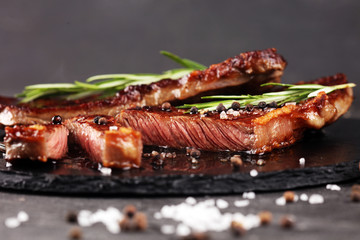 Barbecue Rib Eye Steak or rump steak - Dry Aged Wagyu Entrecote Steak on rustic background