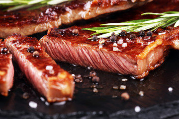 Barbecue Rib Eye Steak or rump steak - Dry Aged Wagyu Entrecote Steak on rustic background